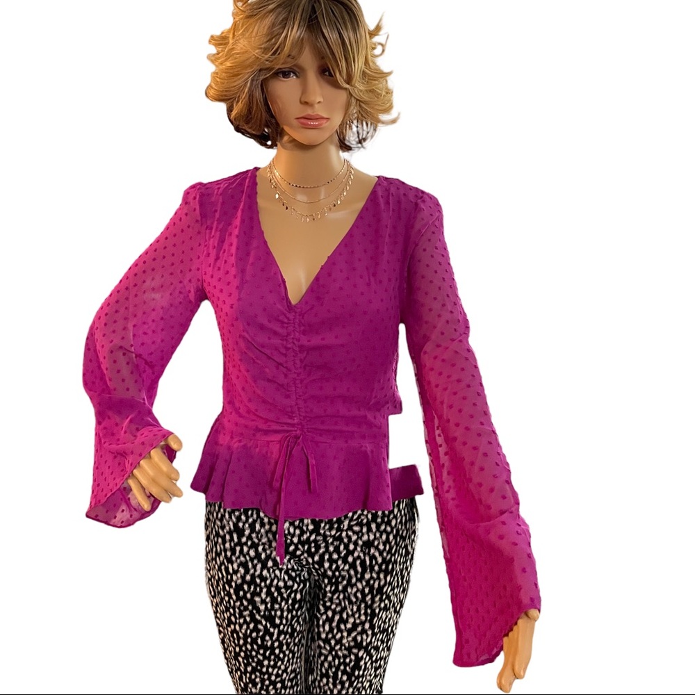 1.State bell sleeved blouse in fuchsia pink. Tie In front.